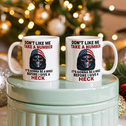 No me agradas Toma un número, pasará un tiempo antes de que me importe un carajo Taza