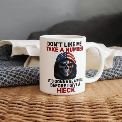No me agradas Toma un número, pasará un tiempo antes de que me importe un carajo Taza