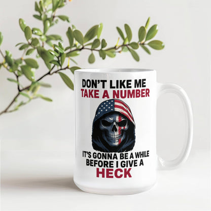 No me agradas Toma un número, pasará un tiempo antes de que me importe un carajo Taza